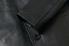 Load image into Gallery viewer, Close-up of REED EST. 1950 Men's Jacket in genuine black lambskin leather with button detail, classic winter coat.