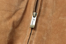 Load image into Gallery viewer, Close-up of zipper on REED Men's Baseball Suede Leather Jacket, highlighting suede texture and brand detail.