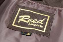 Load image into Gallery viewer, Reed brand label on satin-lined suede leather jacket showcasing quality craftsmanship.