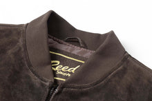 Load image into Gallery viewer, Close-up of Reed men's baseball suede leather jacket collar and label with soft satin lining
