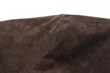 Load image into Gallery viewer, Close-up of brown suede leather fabric texture from REED Men's Baseball Suede Leather Jacket, showing fine craftsmanship.