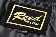 Load image into Gallery viewer, Close-up of REED logo label on men's baseball suede leather jacket