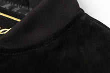 Load image into Gallery viewer, Close-up of REED Men's Baseball Suede Leather Jacket showing soft suede texture and ribbed collar.