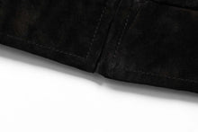Load image into Gallery viewer, Close-up of black imported suede leather, highlighting texture and stitching detail on baseball jacket.