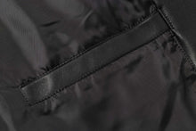 Load image into Gallery viewer, Close-up of REED Men's Premium Lambskin Leather Blazer showcasing soft-touch leather detail, highlighting craftsmanship and quality.