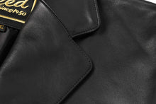 Load image into Gallery viewer, Close-up of REED Men's Premium Lambskin Leather Blazer with soft-touch finish and American fit. Stylish, durable, and classic design.