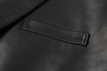 Load image into Gallery viewer, Close-up of black lambskin leather texture on REED men's blazer, showcasing premium craftsmanship and soft-touch feel.
