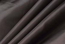 Load image into Gallery viewer, Close-up of smooth black lambskin leather texture, showcasing soft-touch finish ideal for REED men's jackets.
