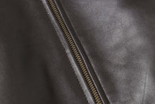 Load image into Gallery viewer, Close-up of a black lambskin leather jacket zipper, showcasing the fine texture and craftsmanship of New Zealand origin.