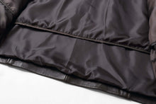 Load image into Gallery viewer, Interior view of REED EST. 1950 Men's Lambskin Leather Car Coat showing insulated lining and craftsmanship details.