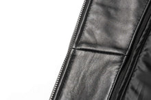 Load image into Gallery viewer, Close-up of black lambskin leather jacket with zipper detail by REED, showcasing smooth texture and premium New Zealand leather.