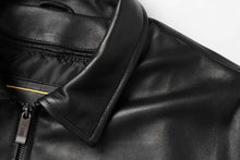 Load image into Gallery viewer, Close-up of REED Men's New Zealand Lambskin Leather Jacket, black, smooth finish, premium quality material.