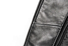 Load image into Gallery viewer, Close-up of black genuine lambskin leather jacket with zip-up closure, showcasing texture and craftsmanship.