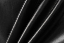 Load image into Gallery viewer, Close-up of genuine lambskin leather material, showcasing its softness and quality.