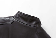Load image into Gallery viewer, REED EST. 1950 men's lambskin leather jacket with stand-up collar, showcasing luxurious material and sleek design, black detail view.