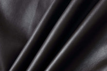 Load image into Gallery viewer, Close-up of genuine lambskin leather fabric in black, showcasing its smooth texture and high-quality finish.