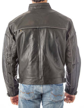 Load image into Gallery viewer, Back view of a black vented leather motorcycle jacket with light reflector, featuring adjustable straps and air vents, worn by a model.