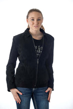 Load image into Gallery viewer, Woman wearing a REED black suede leather jacket, showcasing its satin lining and stylish, comfortable fit.