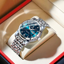 Cargar imagen en el visor de la galería, Luxury men's watch with blue dial and silver bracelet in an open box, showcasing elegant design and sophistication.