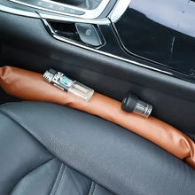 Load image into Gallery viewer, PU leather pad seat filler preventing items from falling between car seat and console, featuring eco-friendly and durable design.