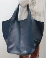 Load image into Gallery viewer, Vegan leather shoulder bag in navy blue, casual PU tote for everyday use, shown held against a light background.