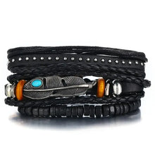Load image into Gallery viewer, Multilayer leather bracelet with feather charm, turquoise bead, and wooden accents, perfect for adding rugged elegance to any outfit.