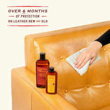Cargar imagen en el visor de la galería, Applying Leather Conditioner to a tan leather couch with bottles shown for over 6 months of protection