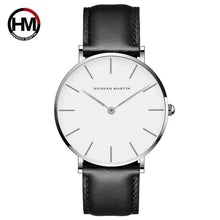 Load image into Gallery viewer, Minimalist silver dial watch with black leather strap, featuring sleek design perfect for both casual and formal occasions.