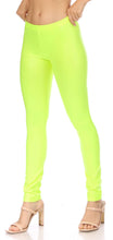 Load image into Gallery viewer, Model wearing neon yellow matte liquid high waist leggings with heels, showcasing the stretch fit and stylish design, made in USA.