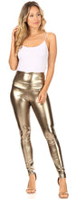 Load image into Gallery viewer, Woman wearing gold metallic high waist leggings and a white tank top