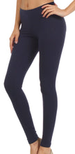 Charger l'image dans la galerie, Woman wearing navy blue footless stretch leggings, perfect for yoga, pilates, or casual wear, made from breathable cotton blend fabric.