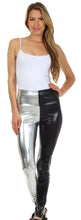 Charger l'image dans la galerie, Model wearing shiny liquid metallic high waist stretch leggings, black and silver color, made in USA, paired with a white tank top.