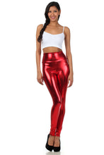 Charger l'image dans la galerie, Woman wearing shiny red high waist metallic leggings with a white top, showcasing bold color and stretch fit. Made in USA.