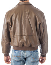 Cargar imagen en el visor de la galería, Brown leather jacket worn by a person on a white background