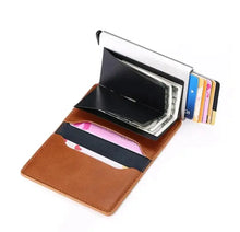 Load image into Gallery viewer, Open anti-theft leather wallet with RFID/NFC protection, displaying multiple card slots and cash storage, made from vegan PU leather.