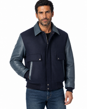 Load image into Gallery viewer, Man wearing REED leather varsity bomber jacket with wool body and leather sleeves, made in USA, classic and stylish design.