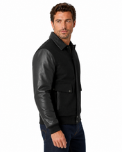 Load image into Gallery viewer, Man wearing REED leather varsity bomber jacket with wool body and leather sleeves, made in USA, classic and stylish design.