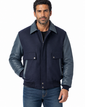 Load image into Gallery viewer, Man wearing REED leather varsity bomber jacket with wool body and leather sleeves, made in USA, classic and stylish design.