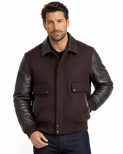 Load image into Gallery viewer, Man wearing REED leather varsity bomber jacket with wool body and leather sleeves, made in USA, classic and stylish design.