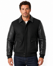 Load image into Gallery viewer, Man wearing REED leather varsity bomber jacket with wool body and leather sleeves, made in USA, classic and stylish design.