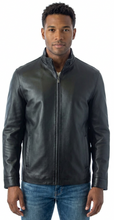 Load image into Gallery viewer, Man wearing a black leather jacket and blue jeans on a white background