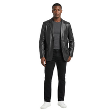 Load image into Gallery viewer, Man wearing a black leather jacket, gray shirt, and black pants on a white background