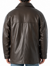 Load image into Gallery viewer, Man wearing a brown leather jacket and blue jeans on a white background