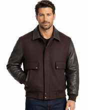 Load image into Gallery viewer, Man wearing REED leather varsity bomber jacket with wool body and leather sleeves, made in USA, classic and stylish design.