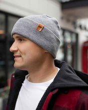 Load image into Gallery viewer, Man wearing NEW HAAKWEAR H-Stitch Cuffed Beanie - Designed and Made in USA (Patent Pending Design) - Koala Gray, outdoors.