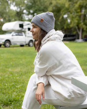 Load image into Gallery viewer, Person wearing NEW HAAKWEAR H-Stitch Cuffed Beanie - Designed and Made in USA (Patent Pending Design) - Koala Gray outdoors
