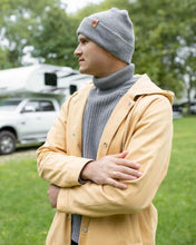 Load image into Gallery viewer, Man wearing NEW HAAKWEAR H-Stitch Cuffed Beanie - Designed and Made in USA (Patent Pending Design) - Koala Gray in outdoor setting