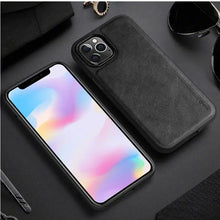 Load image into Gallery viewer, Luxury hybrid protective leather iPhone case showcasing elegance and durability on a black background.