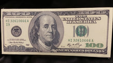 Cargar imagen en el visor de la galería, One hundred dollar bill on a black background