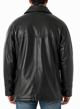Load image into Gallery viewer, Person wearing a black leather jacket and blue jeans on a white background